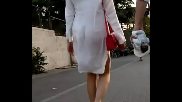 شاهد Woman in almost transparent dress أنبوب الطاقة