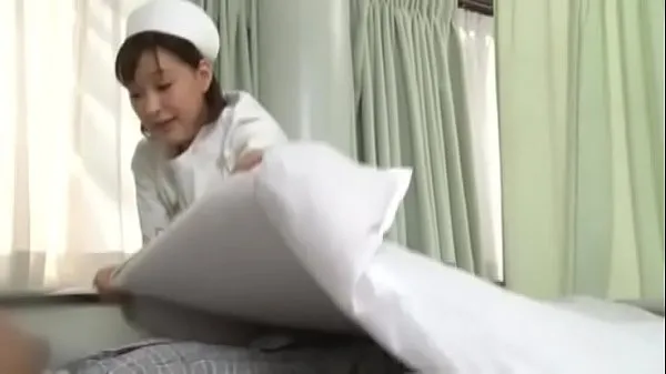 Bekijk Sexy japanese nurse giving patient a handjob Energy Tube