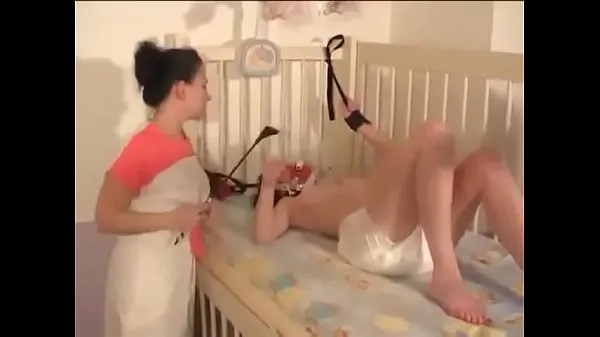 Watch adult b. girl in diaper cared for from lesbian in nurse uniform energy Tube