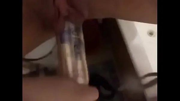 Watch the young girl masturbates in a bathroom energy Tube