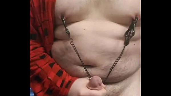 Watch Chubster masturbating with clamps on energy Tube