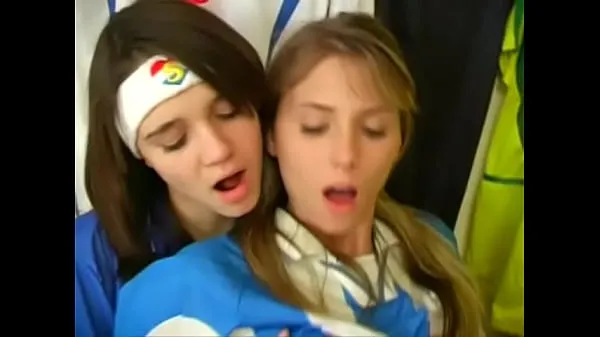 Sledujte Girls from argentina and italy football uniforms have a nice time at the locker room energy Tube